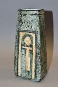 A TROIKA POTTERY COFFIN VASE DECORATED BY SIMONE KILBURN, the rough textured exterior with a green/