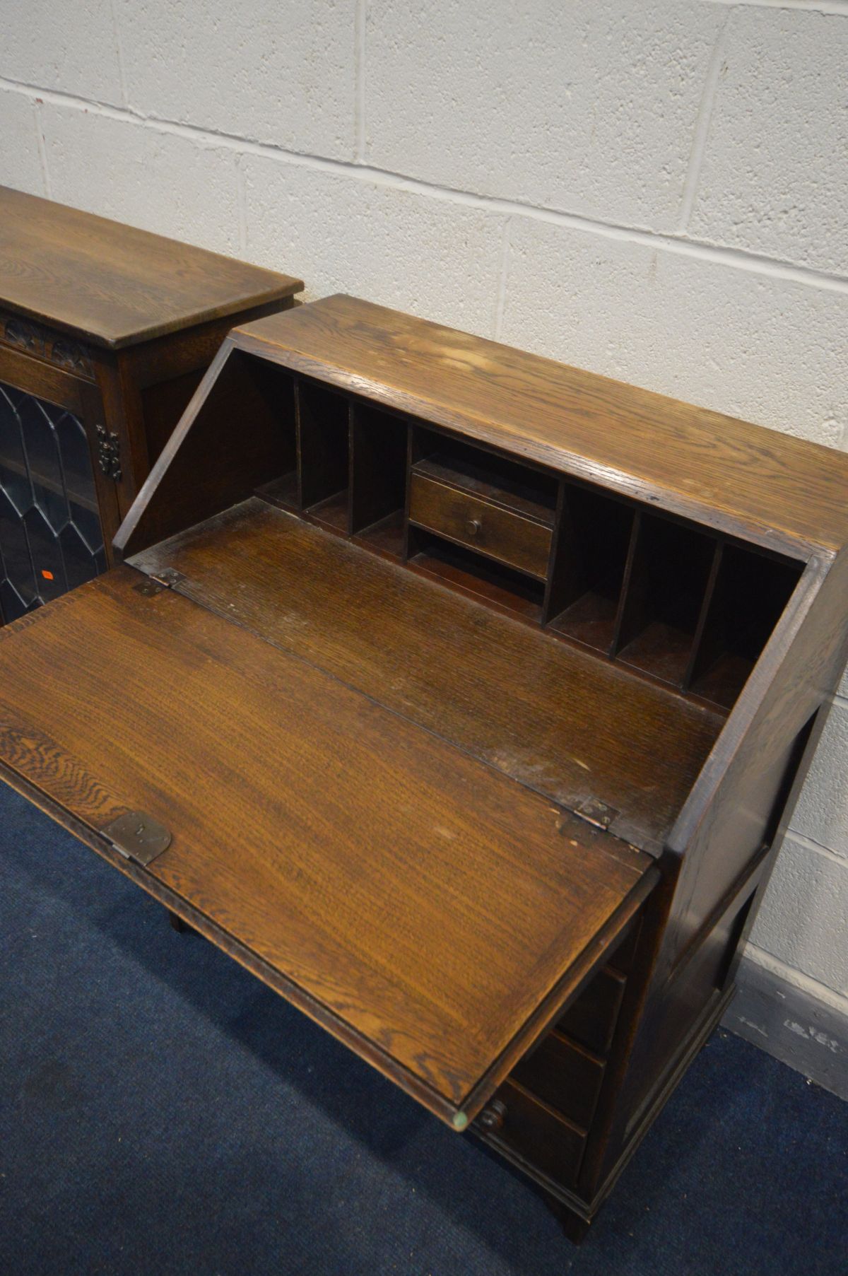 AN OLD CHARM STYLE OAK BUREAU, fall front enclosing a fitted interior above four drawers together - Image 2 of 3