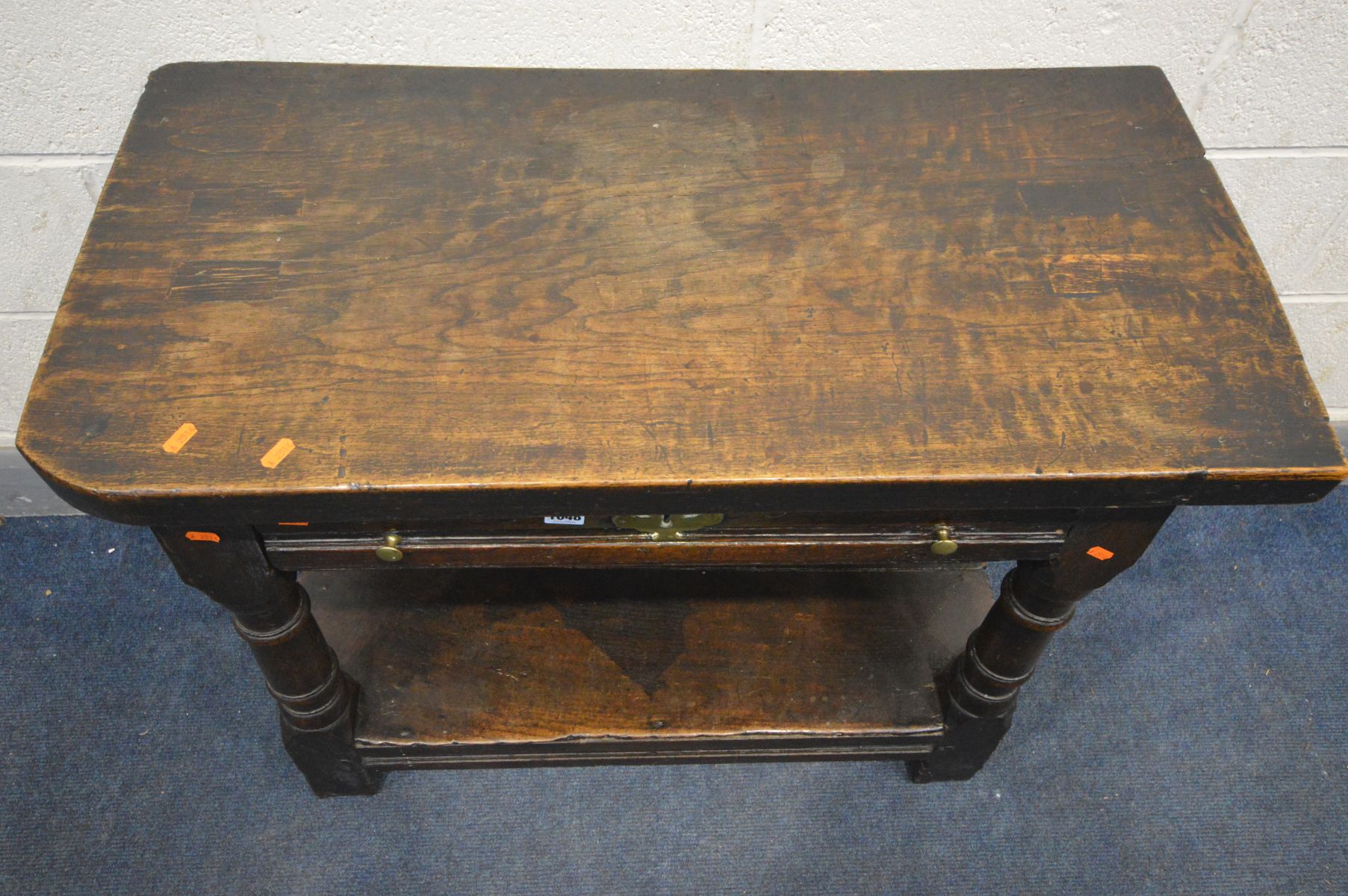 A GEORGE I WELSH OAK SIDE TABLE, the later plank top above a long single drawer with a brass - Image 3 of 8