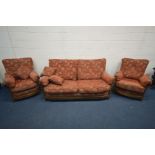 AN ERCOL RENAISSANCE THREE PIECE LOUNGE SUITE, comprising a sofa, length 195cm, and a pair of