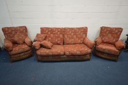 AN ERCOL RENAISSANCE THREE PIECE LOUNGE SUITE, comprising a sofa, length 195cm, and a pair of