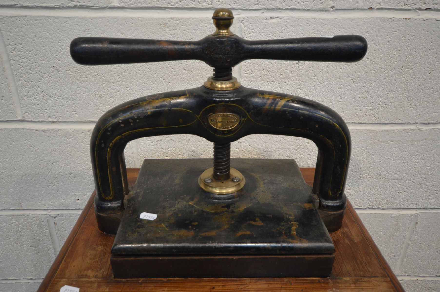 A VINTAGE CAST IRON BOOKPRESS, with a label reading William Mitchell, Birmingham & London, on a - Image 2 of 4