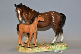 A BESWICK MOTHER & FOAL GROUP 953, second version on irregular base, brown mare/orange bay foal