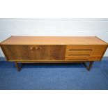 A YOUNGER LTD MID CENTURY TEAK SIDEBOARD, with three drawers, the top drawer with green baize