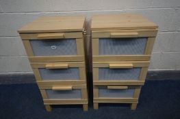 A PAIR OF MODERN BEECH EFFECT THREE DRAWER BEDSIDE CABINETS