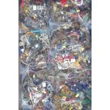 A LARGE QUANTITY OF COSTUME JEWELLERY, to include seven individual bags of mixed jewellery