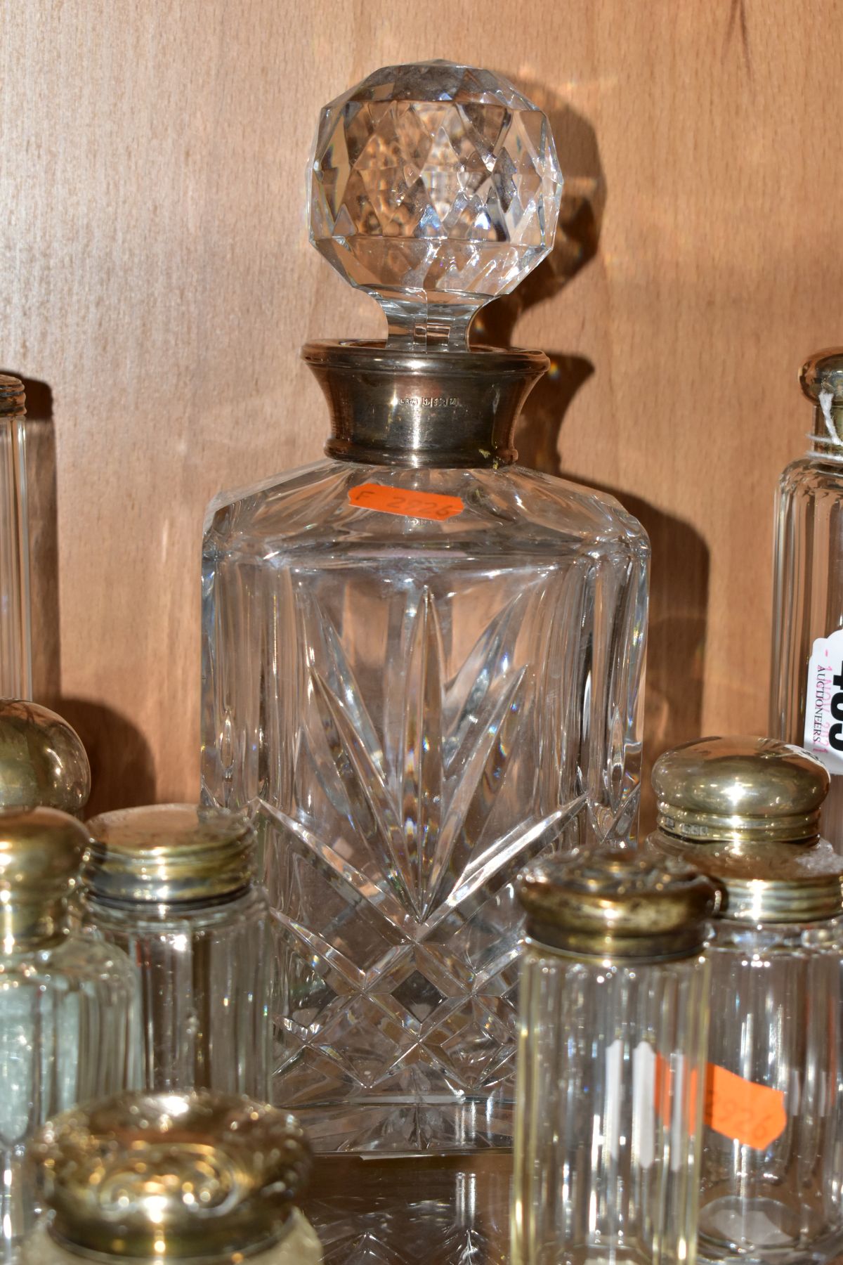 A SQUARE GLASS DECANTER WITH HALLMARKED SILVER COLLAR AND FOURTEEN SILVER TOPPED GLASS TOILET - Image 4 of 12