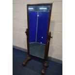AN EARLY VICTORIAN MAHOGANY CHEVAL MIRROR, with turned and fluted uprights, width 75cm x height