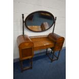AN EDWARDIAN MAHOGANY AND INLAID PEDESTAL DRESSING TABLE, with rounded ends, single cupboard