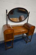 AN EDWARDIAN MAHOGANY AND INLAID PEDESTAL DRESSING TABLE, with rounded ends, single cupboard
