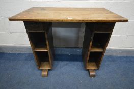 AN EARLY 20TH CENTURY OAK DESK with twin slim pedestals, and two drawers, width 90cm x depth 50cm