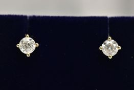 A PAIR OF 9CT GOLD DIAMOND STUD EARRINGS, each fitted with a four-claw setting, round brilliant