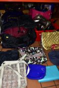 FOUR TUBS AND TWO HOLDALLS CONTAINING A QUANTITY OF HANDBAGS AND SHOULDER BAGS ETC, to include