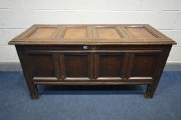 A GEORGIAN OAK PANELLED COFFER, width 141cm x depth 57cm x height 69cm (condition:- some ink stains)