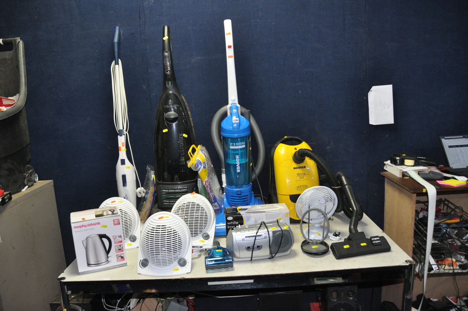 FOUR VACUUM CLEANERS, three fan heaters, kettle, iron and a small radio etc (all PAT pass and