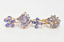 FOUR 9CT GOLD TANZANITE DRESS RINGS, two flower clusters set with pear cut tanzanite's, one with a