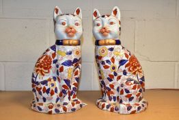 A PAIR OF REPRODUCTION IMARI STYLE PORCELAIN SEATED CAT FIGURES, printed pseudo character marks to