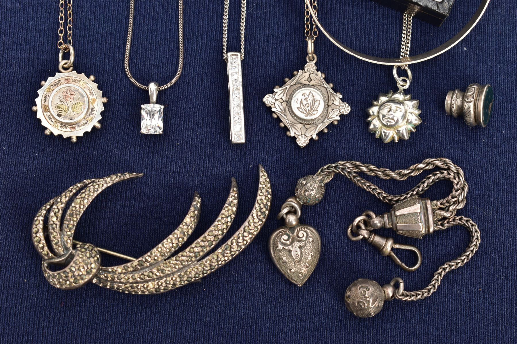 A SELECTION OF SILVER AND WHITE METAL JEWELLERY, to include a silver Victorian pendant of a circular - Image 3 of 3