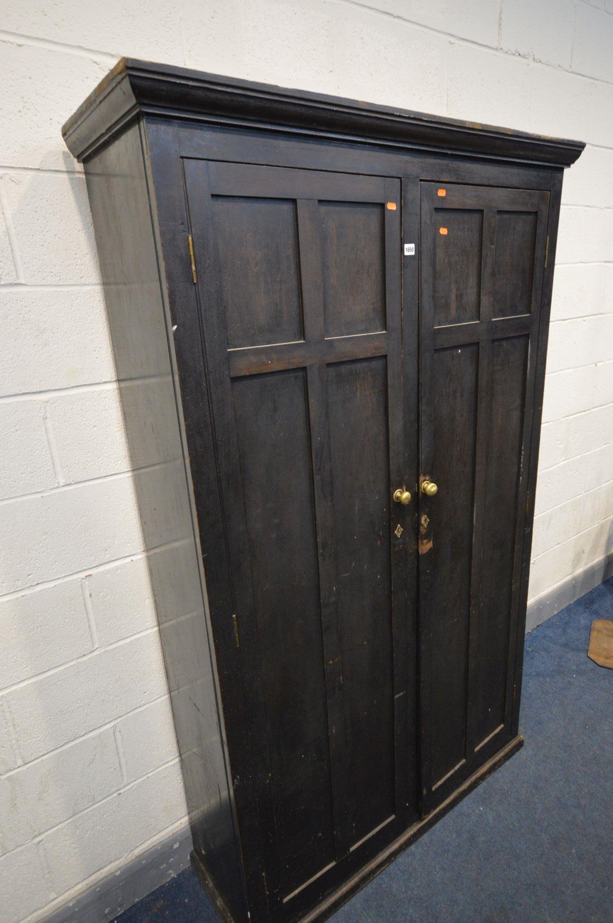 AN EARLY 20TH CENTURY STAINED PINE CUPBOARD, with double panelled doors enclosing ten divisions, - Image 2 of 3