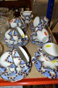 AN ART DECO PART TEASET, comprising eleven cups and saucers, twelve side plates, milk jug and