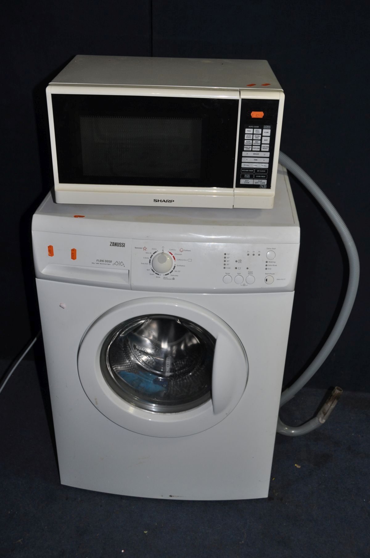 A ZANUSSI ZWG 6161P WASHING MACHINE (PAT pass and powers up but not been tested further) and a Sharp