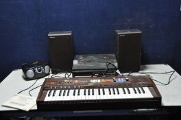 A VINTAGE CASIOTONE 403 KEYBOARD with rosewood effect case along with stand and manual, a vintage