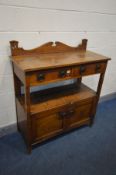 AN ARTS AND CRAFTS OAK BUFFET, with a raised back, two drawers and double panelled cupboard doors,