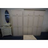 A CREAM FRENCH BEDROOM FITMENTS, comprising three double door wardrobes, four top sections, along