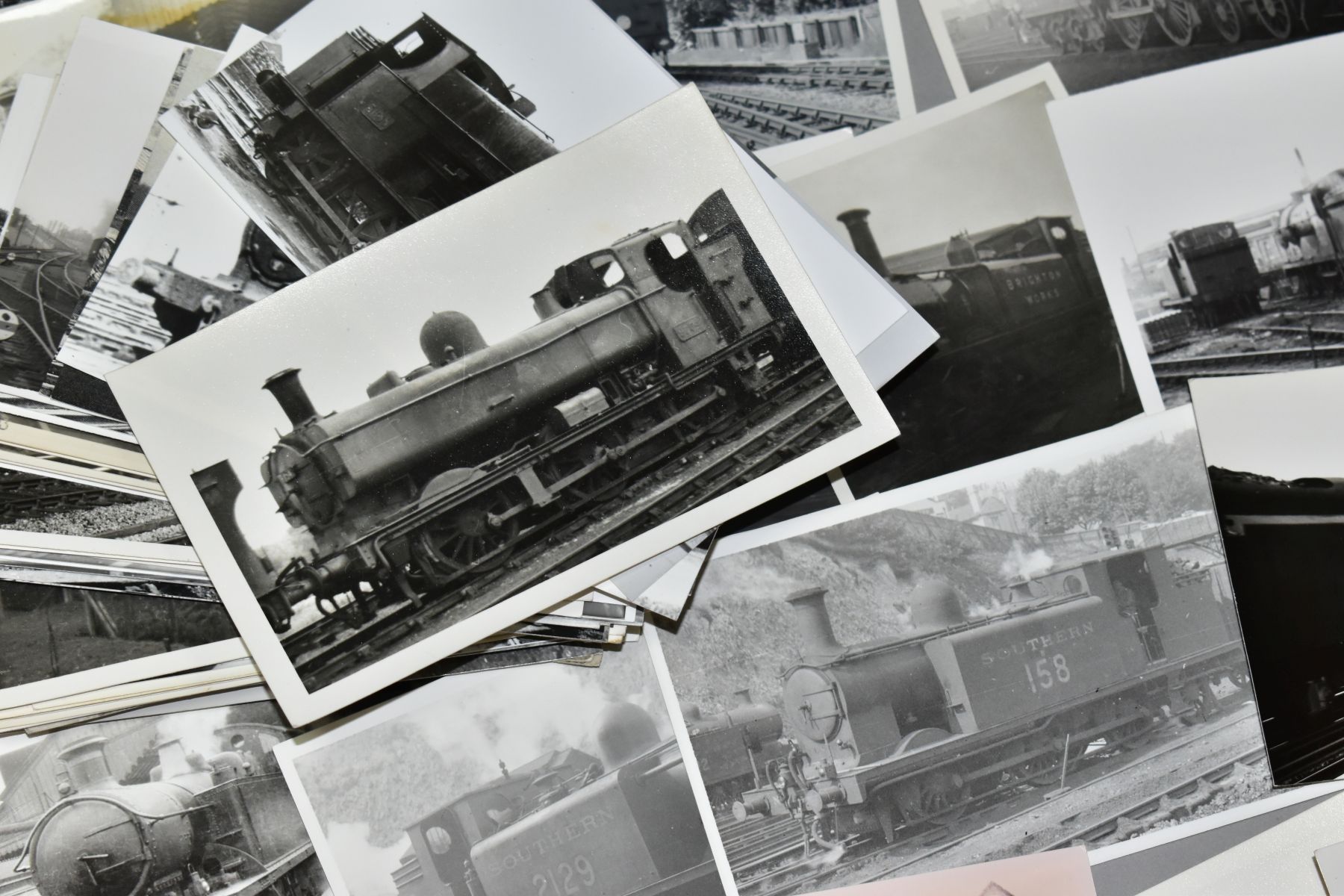 A QUANTITY OF ASSORTED BLACK AND WHITE POSTCARD SIZE PHOTOGRAPHS OF BRITISH STEAM LOCOMOTIVES, - Image 2 of 2