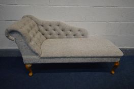 A MODERN BEIGE UPHOLSTERED CHAISE LOUNGUE, on cabriole legs, (no fire safety label but compliant