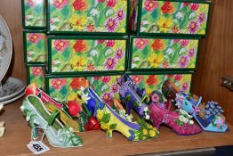 A BOXED SET OF TWELVE WILLOW HALL 'FLOWERS OF THE MONTH' RESIN LADIES SHOE ORNAMENTS (12) (Condition