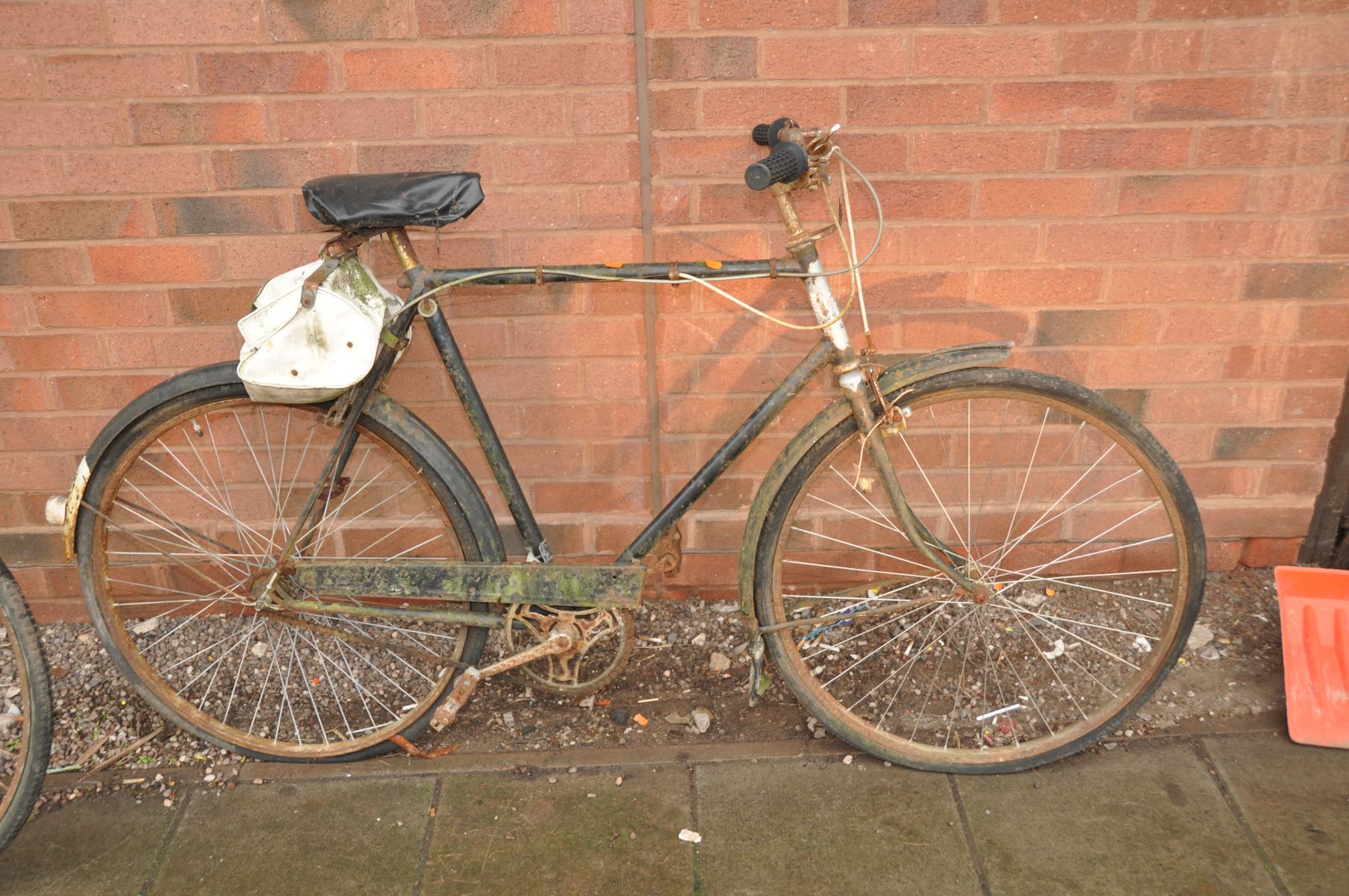 A VINTAGE TRIUMPH GENTS BIKE with three speed gears, 23in frame (distressed)