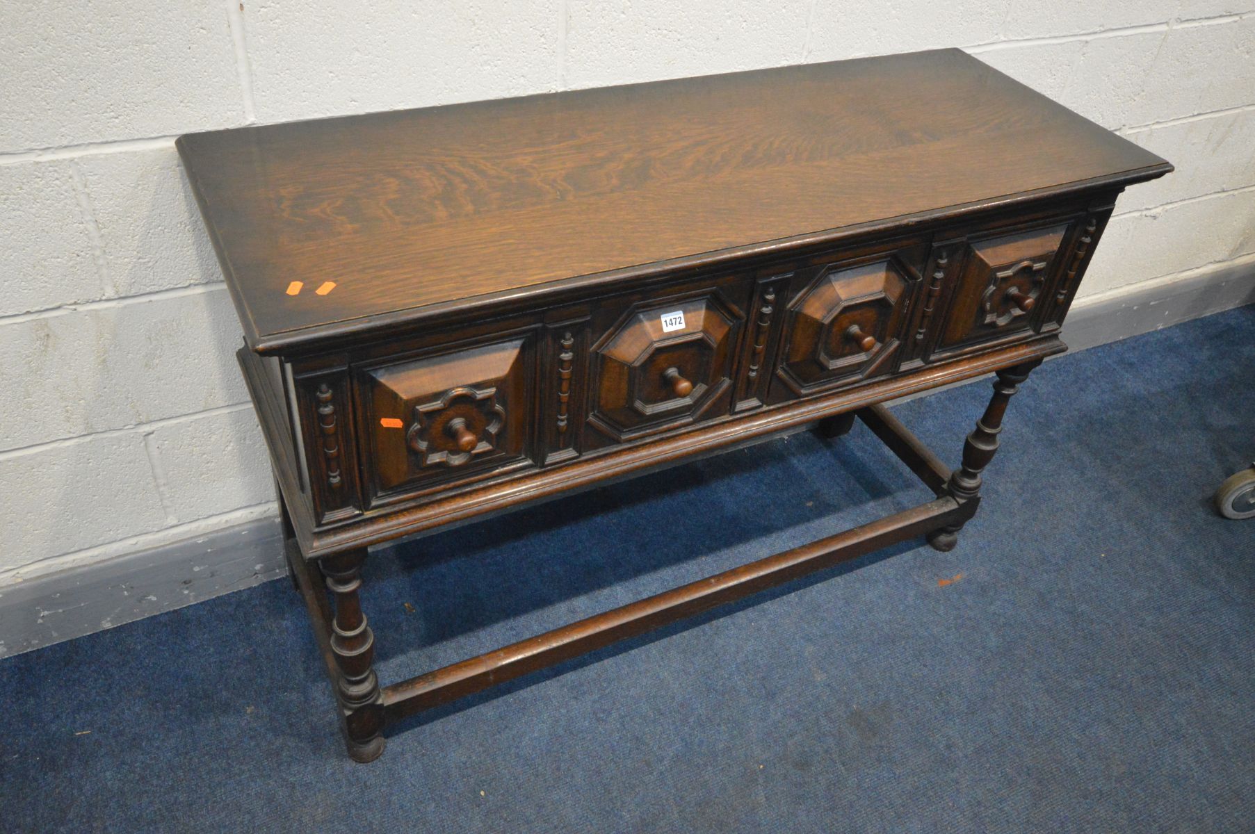 AN EARLY 20TH CENTURY OAK SIDEBOARD, two geometric fronted drawers, on a box stretcher, width - Image 2 of 2
