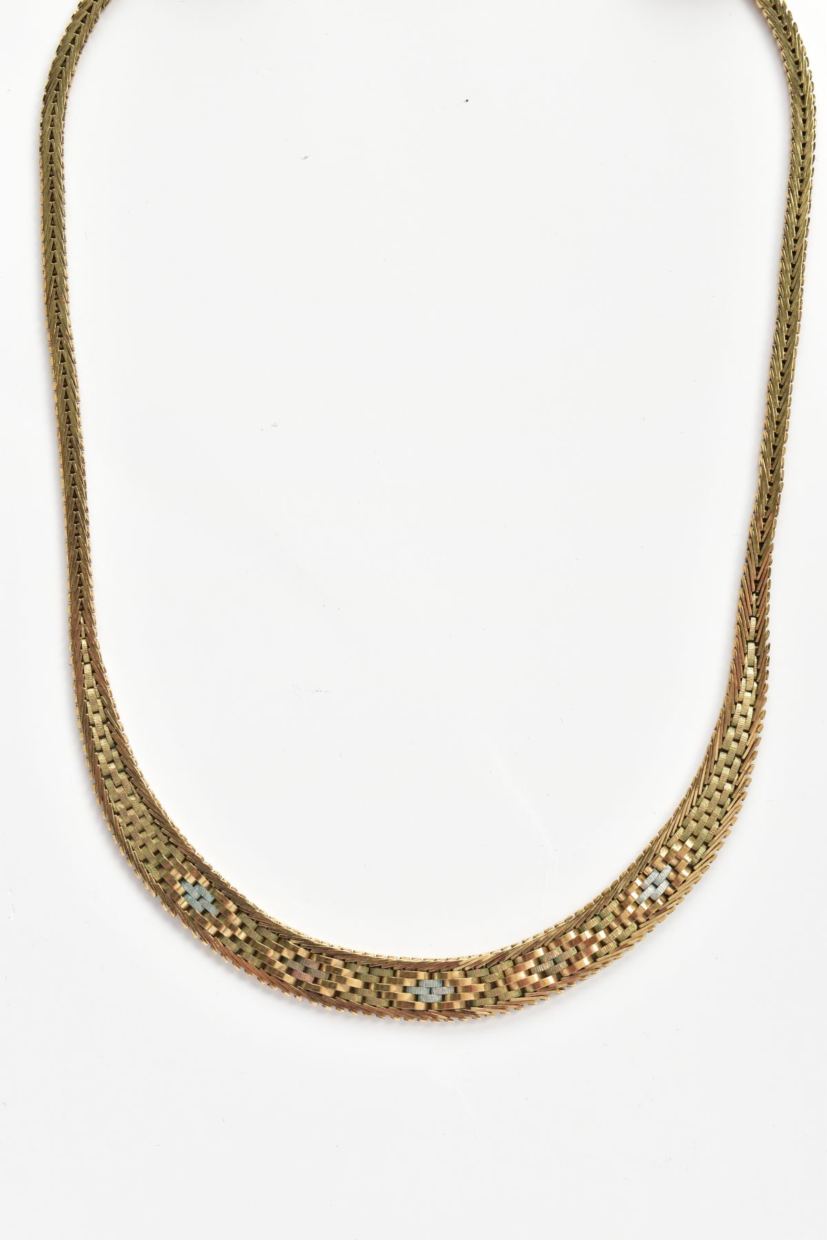 A 9CT GOLD NECKLACE, the tri-colour graduated woven design necklace, leading to a herringbone - Image 2 of 3