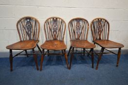 A SET OF FOUR 19TH CENTURY ELM AND YEW WOOD WHEEL BACK WINDSOR KITCHEN CHAIRS (condition:- some