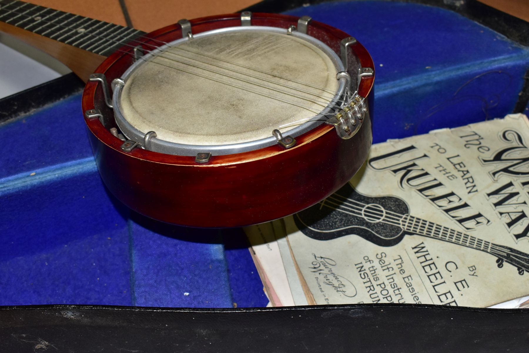 A RELIANCE UKELELE-BANJO IN A CARRY CASE, comes with a small quantity of sheet music - Image 6 of 6
