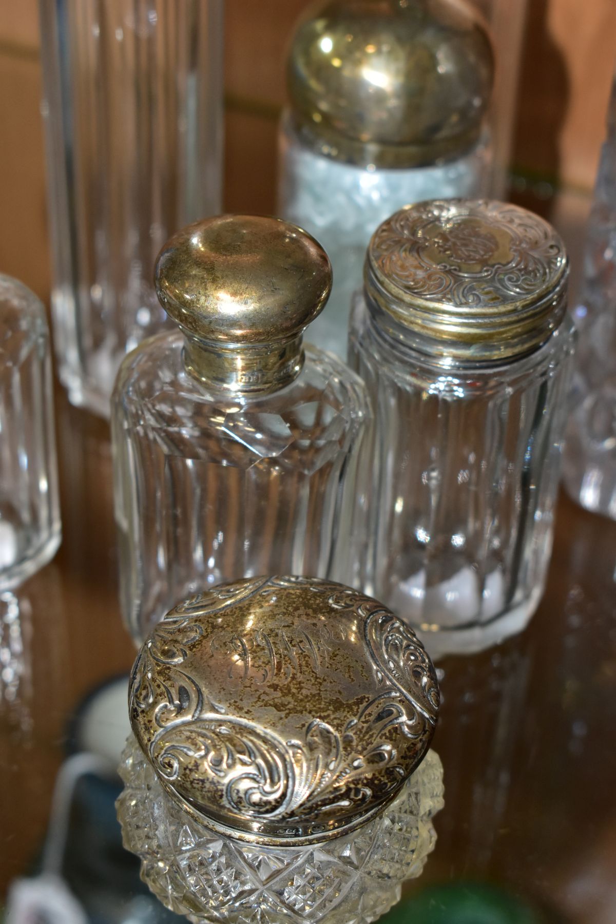 A SQUARE GLASS DECANTER WITH HALLMARKED SILVER COLLAR AND FOURTEEN SILVER TOPPED GLASS TOILET - Image 8 of 12