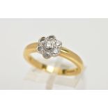 AN 18CT GOLD DIAMOND CLUSTER RING, the brilliant cut diamonds in a floral cluster to the plain band,