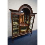 AN EDWARDIAN MAHOGANY DISPLAY CABINET, central rounded top above foliate blind fretwork detail,