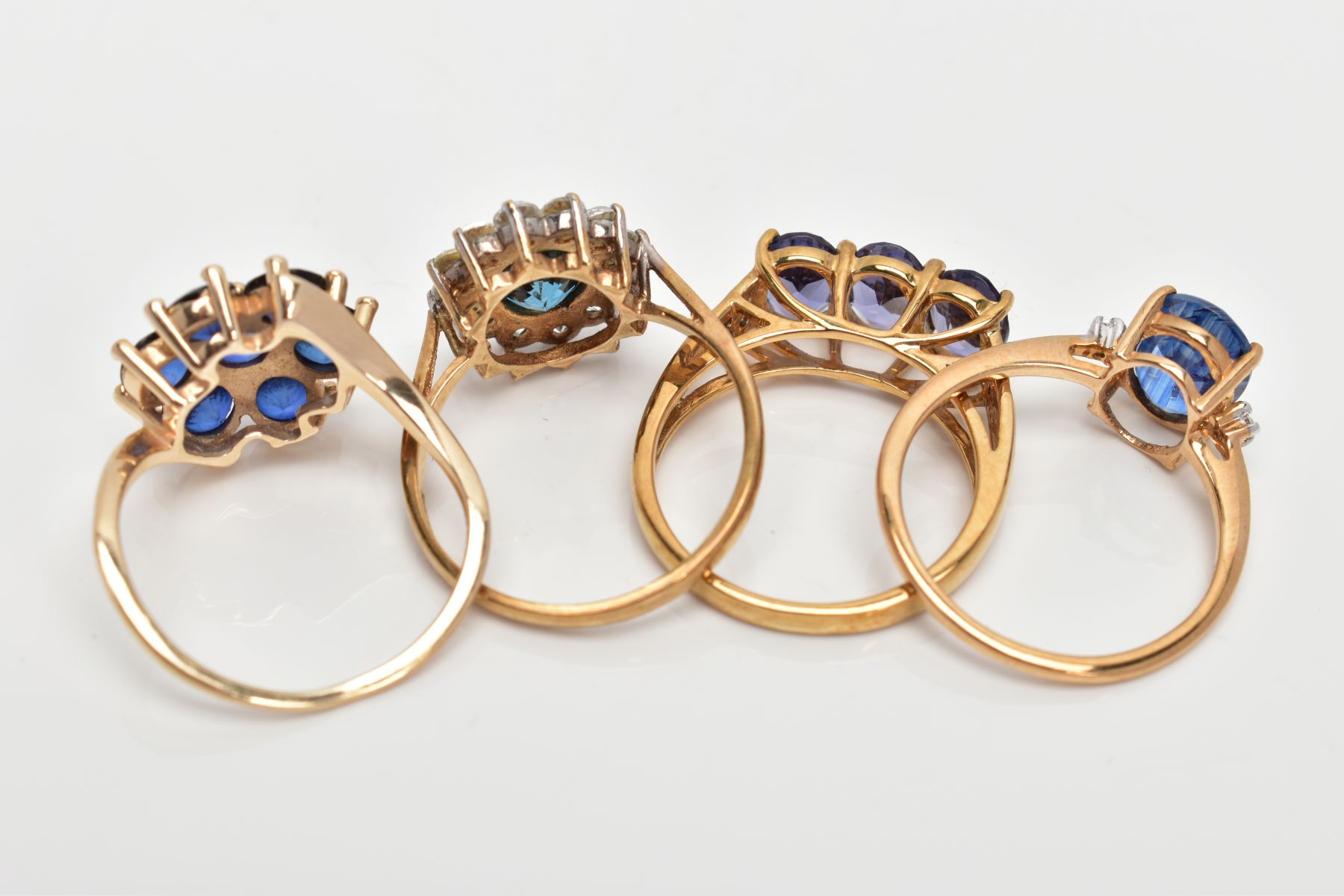 FOUR 9CT GOLD GEM SET RINGS, of various designs, set with gemstones such as sapphire, kyanite, - Image 3 of 3