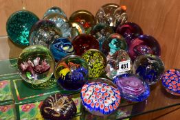 TWENTY GLASS PAPERWEIGHTS AND A PLASTIC PAPERWEIGHT, all modern, mostly unbranded, tallest 9.5cm,