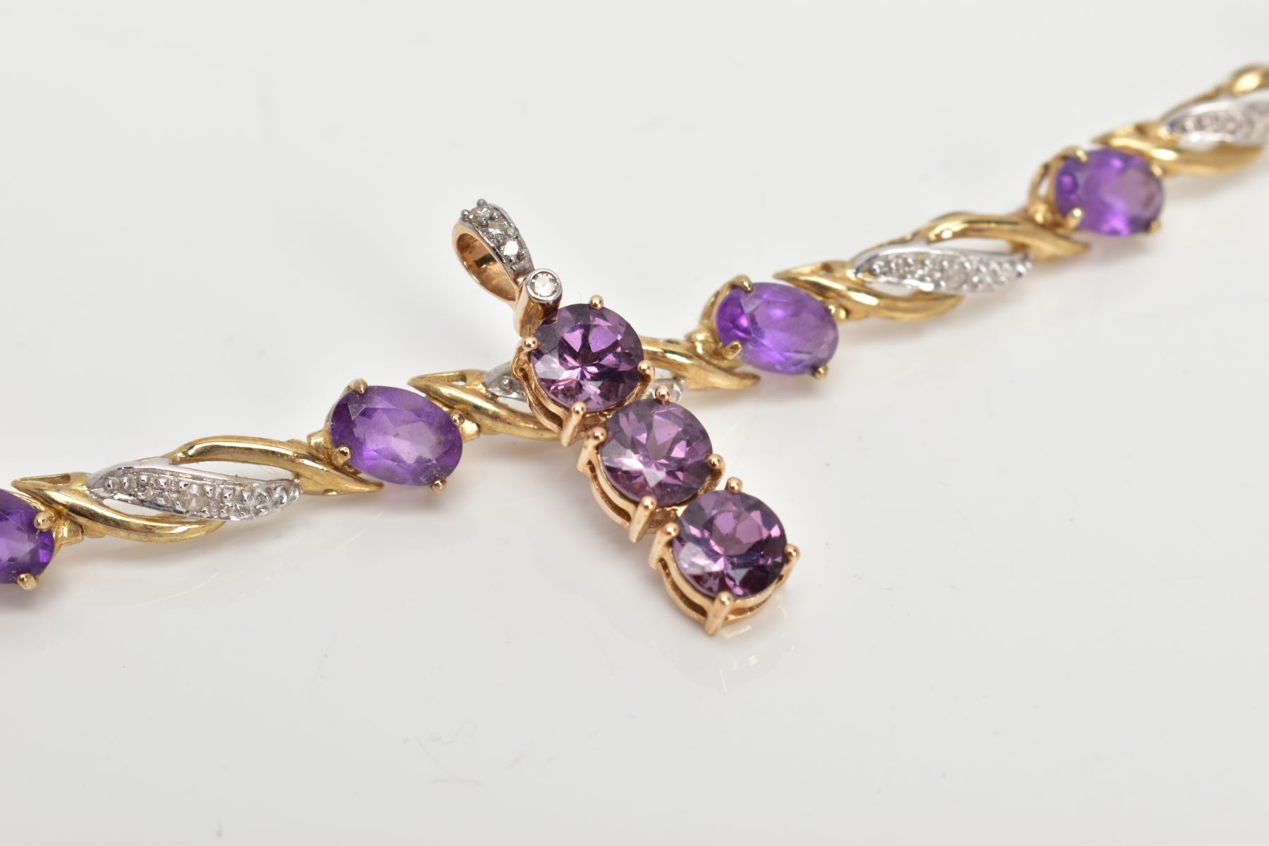 A 9CT GOLD AMETHYST AND DIAMOND LINE BRACELET AND PENDANT, the line bracelet set with ten oval cut - Image 4 of 5