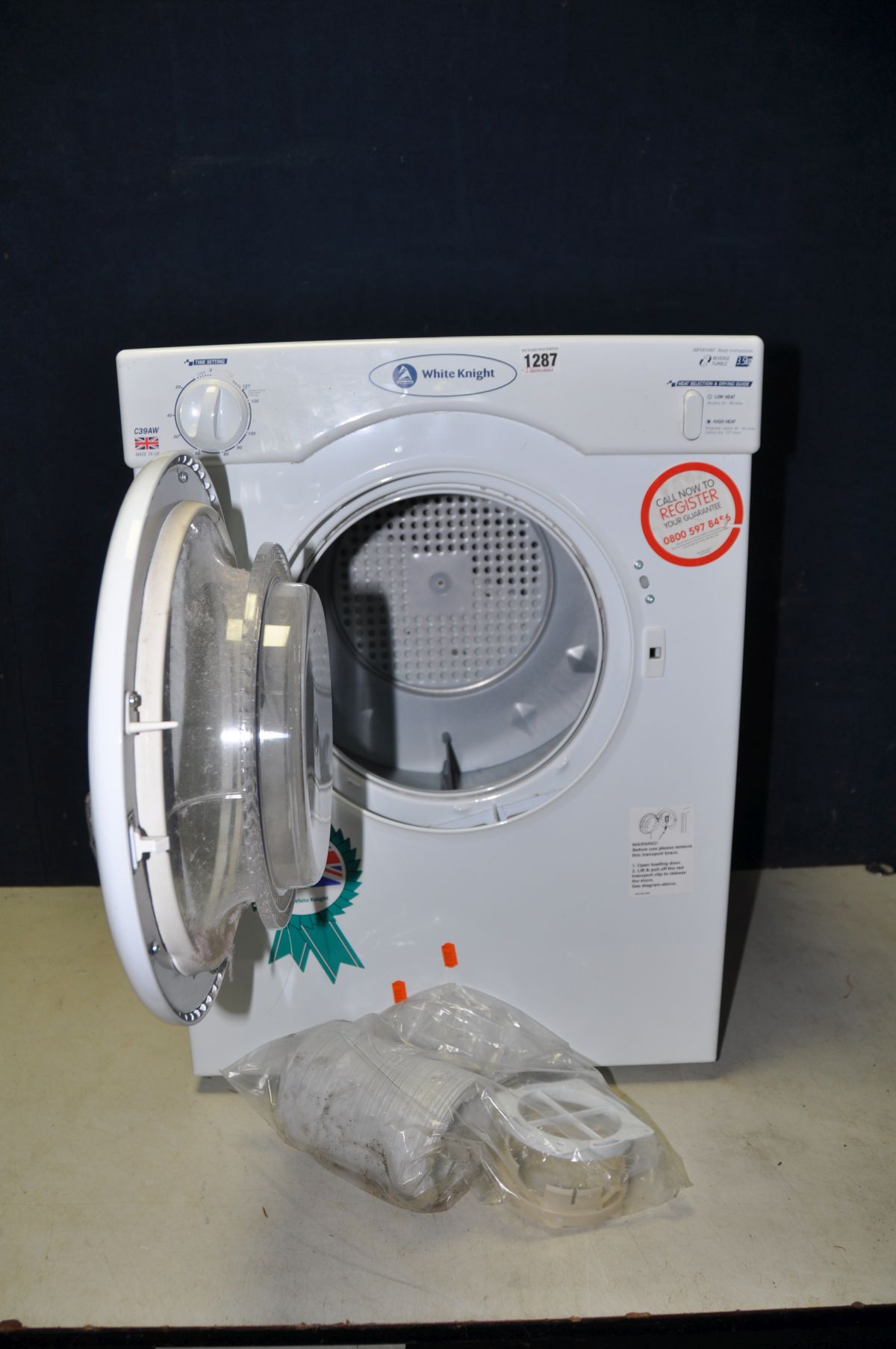 A SMALL WHITE KNIGHT C39AW 3.5kg TUMBLE DRYER width 50cm x depth 48cm x height 68cm and a Warmline - Image 2 of 4
