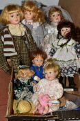 A BOX OF COLLECTORS DOLLS, eight dolls, four on stands, tallest approximately 46cm, to include '