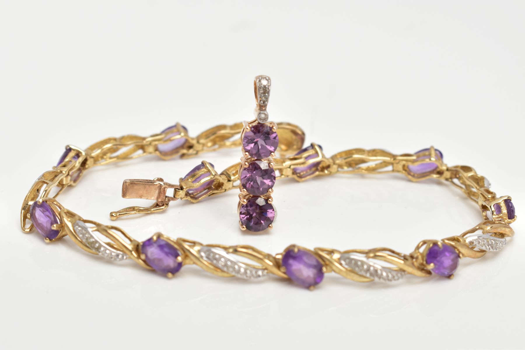 A 9CT GOLD AMETHYST AND DIAMOND LINE BRACELET AND PENDANT, the line bracelet set with ten oval cut - Image 2 of 5