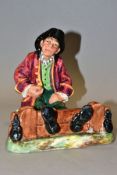 A ROYAL DOULTON FIGURE 'IN THE STOCKS' HN2163, style two, issued 1955-1959, designed by M.Nicoll,