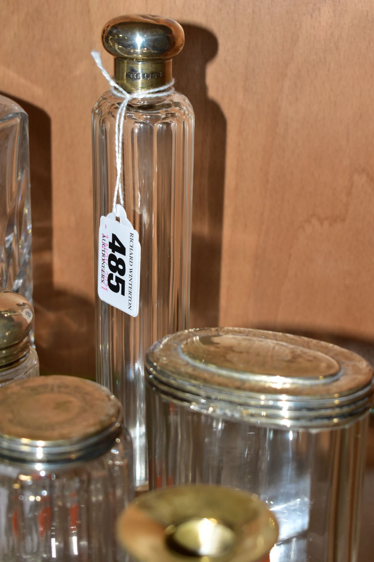 A SQUARE GLASS DECANTER WITH HALLMARKED SILVER COLLAR AND FOURTEEN SILVER TOPPED GLASS TOILET - Image 5 of 12