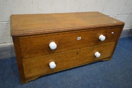 A LOW OAK CHEST OF TWO DRAWERS, with ceramic handles, width 100cm x depth 43cm x height 46cm