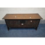 AN EARLY 18TH CENTURY OAK SIX PLANK BOARDED CHEST, with a moulded edge and iron hinged lid, and