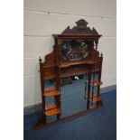 AN EDWARDIAN WALNUT OVERMANTEL MIRROR, width 89cm x height 128cm